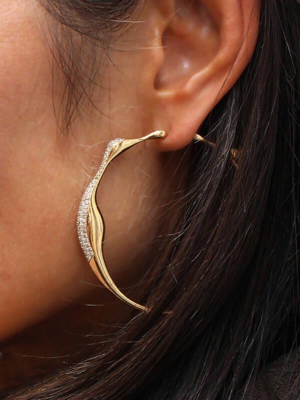 la femme hoop rose gold earrings with diamonds