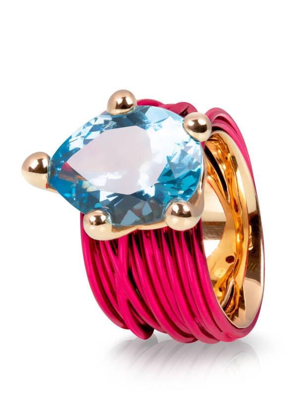 The wire ring with london blue topaz and fuchsia coating